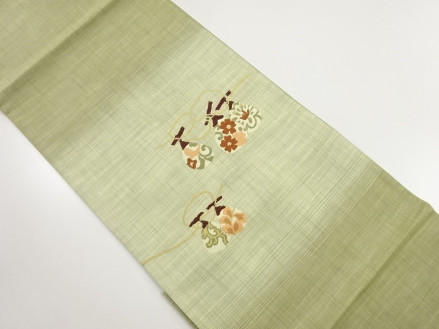 リサイクル　手織り紬干し柿に花模様織り出し袋帯